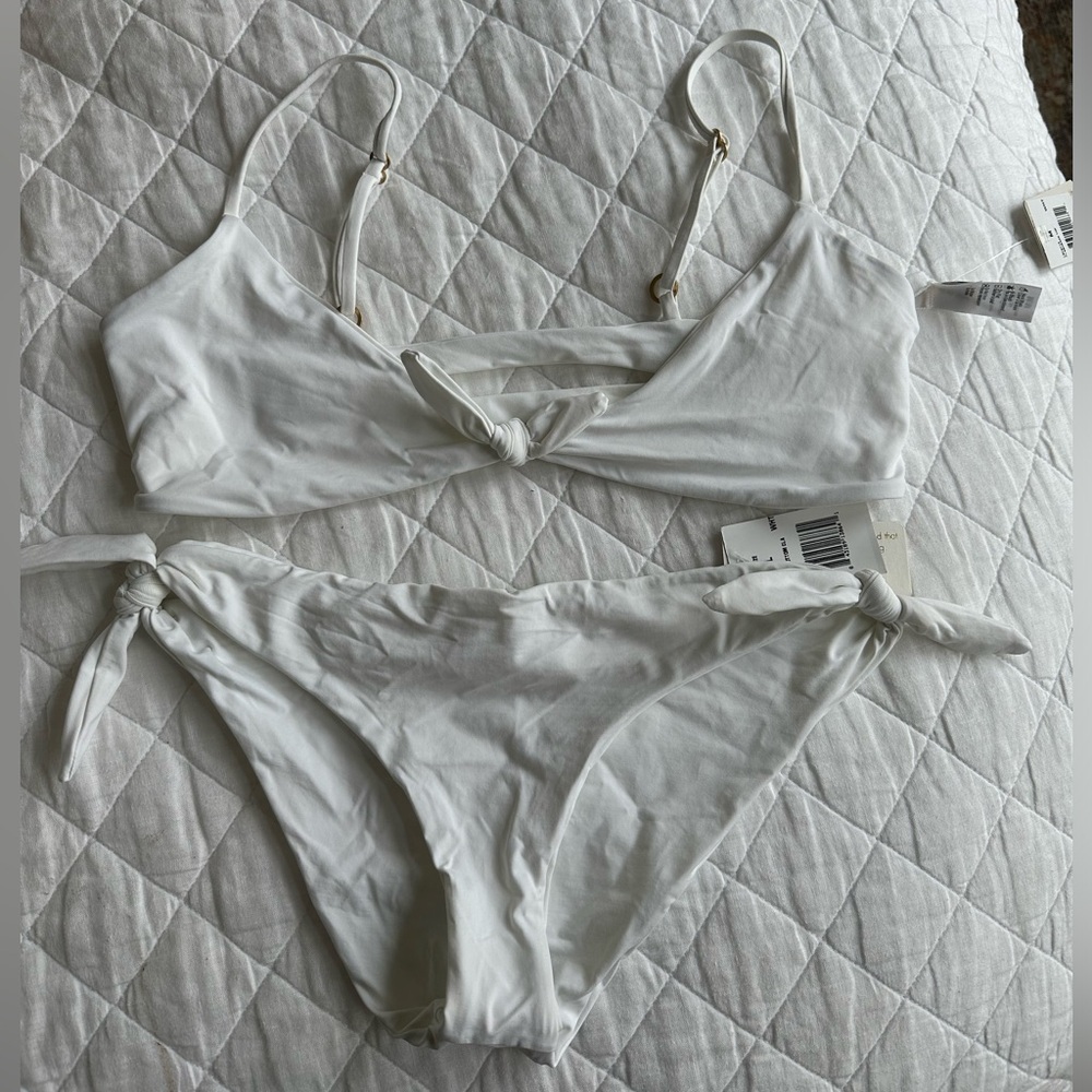 Lspace white Bikini top is a medium bottom is a large**